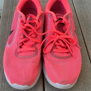 Women’s hot pink Nike shoes